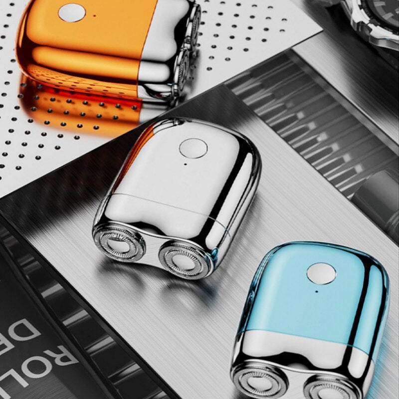 Mini Magnetic Charging Electric Shaver for Men with a Rubber Coated Handle and an IPX7 Rating in Three Colors