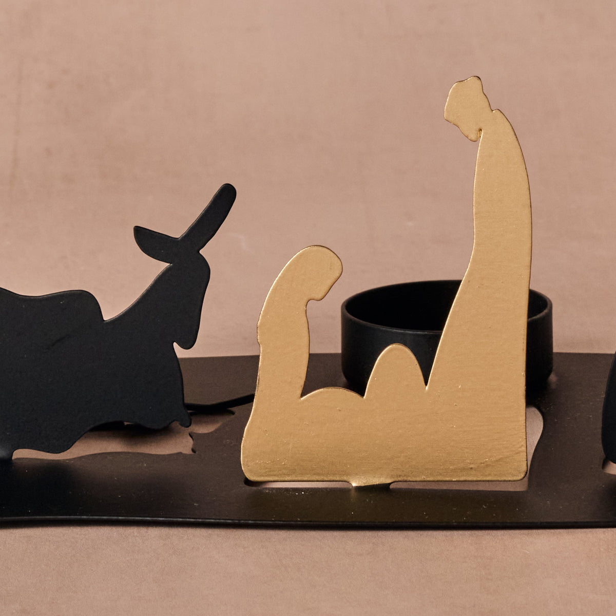 Bent Iron Nativity Silhouette with Golden Holy Family, Gold Star and a Built In Candle Cup